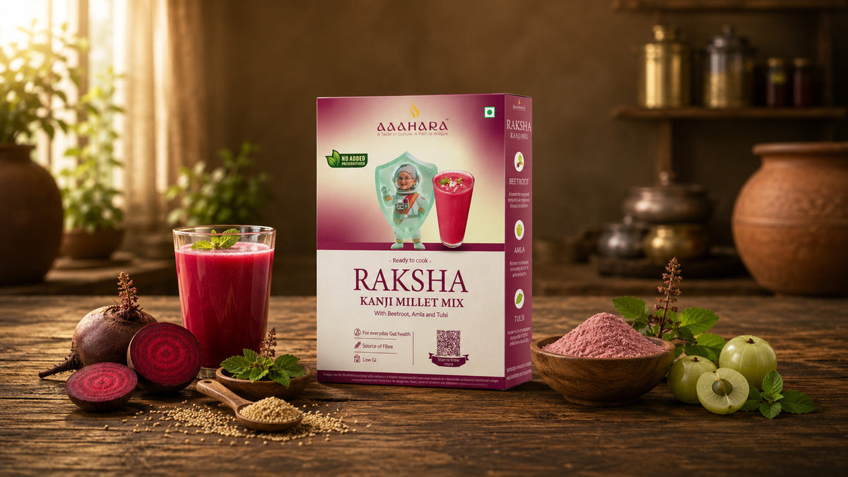 Aaahara Raksha Kanji Mix box with beetroot drink, millet, amla, and tulsi on a rustic kitchen table